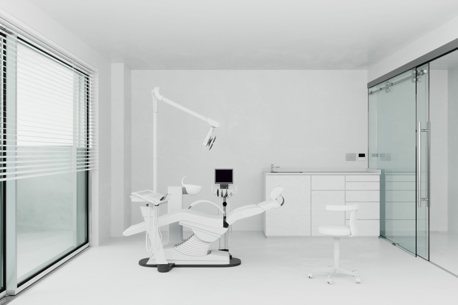 Clean white dental clinic interior fit-out with modern chair and glass sliding doors.